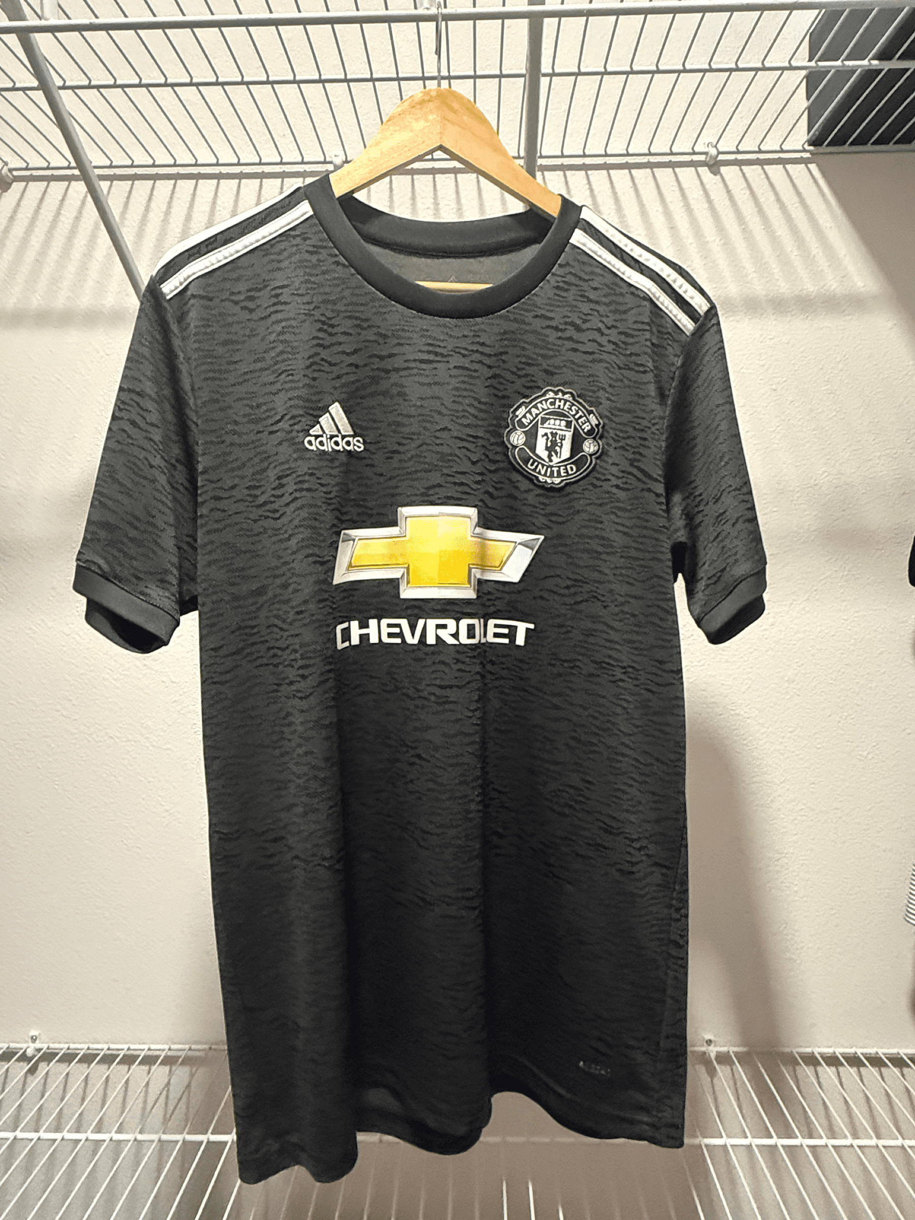 Manchester United 2020/21 home shirt held by @mgrauer02_f5bf2